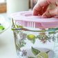 Blooming Measure: Floral Glass Measuring Cup with Lid